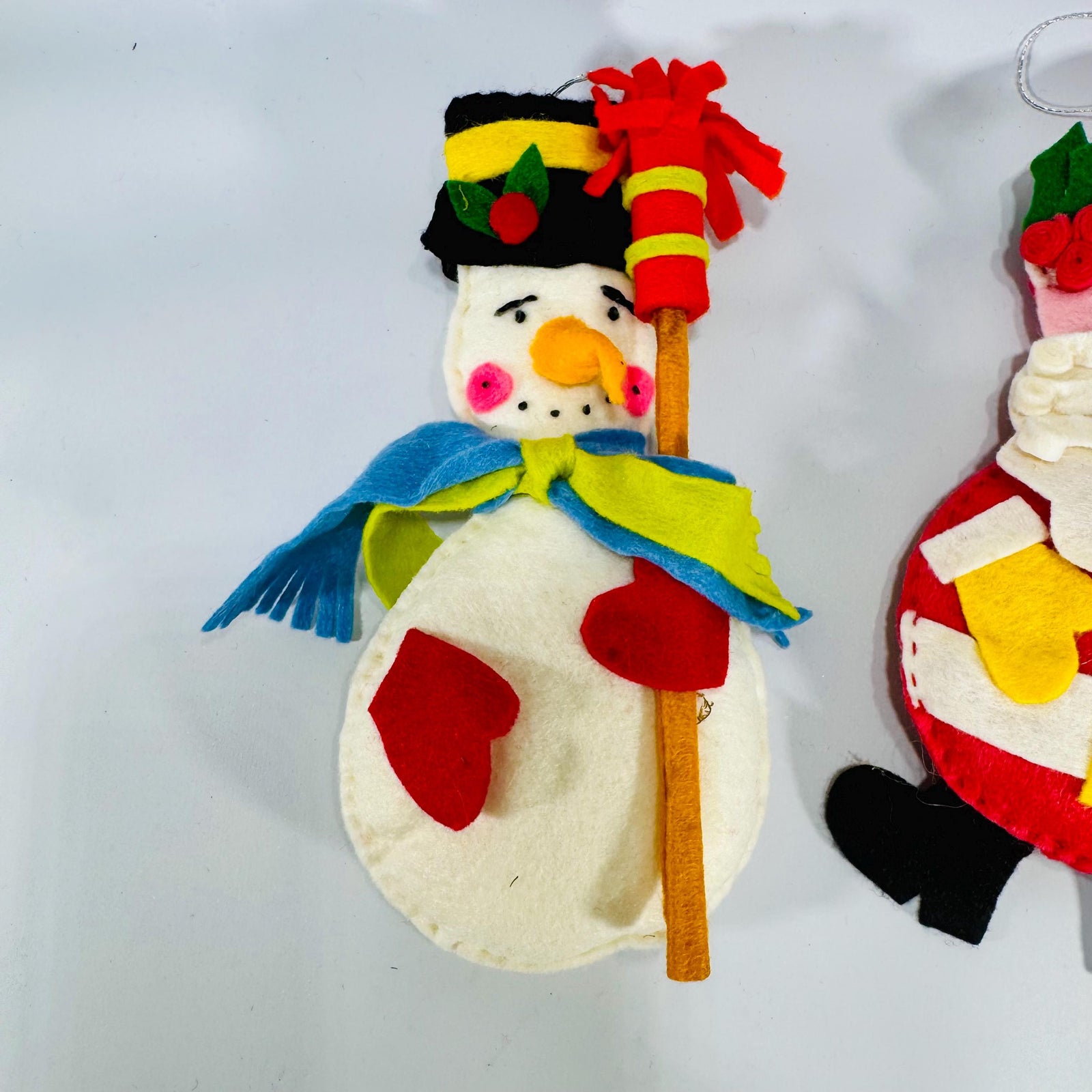 Large handmade felt Santa and snowman ornaments—8.6 inches tall each, layered felt with stitching and stuffing, shown on a light background.