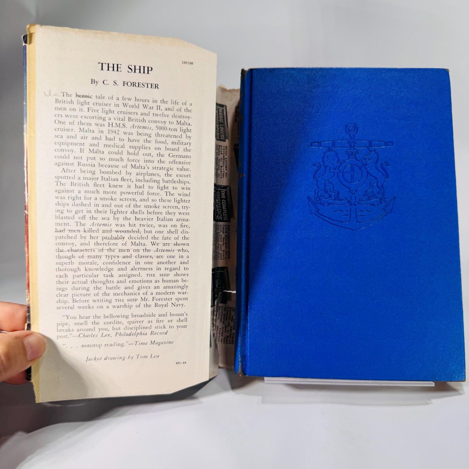 Front jacket of The Ship by C. S. Forester, Sun Dial Press 1944, showing battle-scene art with chips and tears; blue cloth boards beneath.