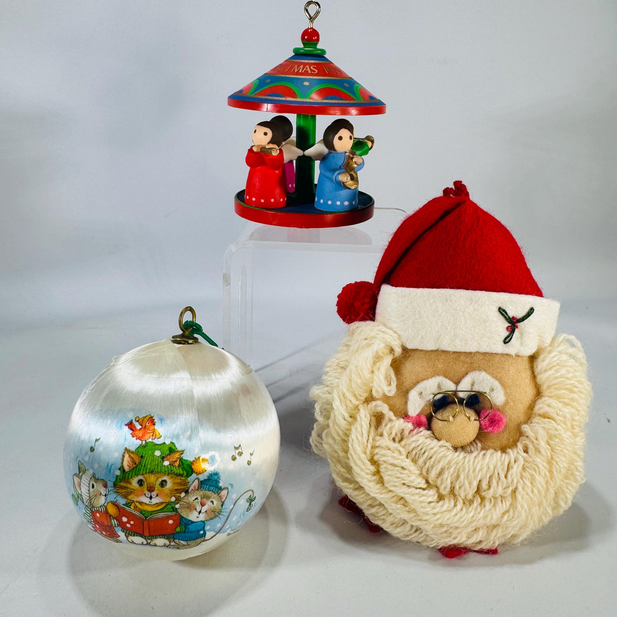 Vintage Christmas Ornaments Trio: 1979 Hallmark Wood Carousel, 1980 Current Satin Cat Ball, Plush Yarn Santa Face | Retro Tree Decor