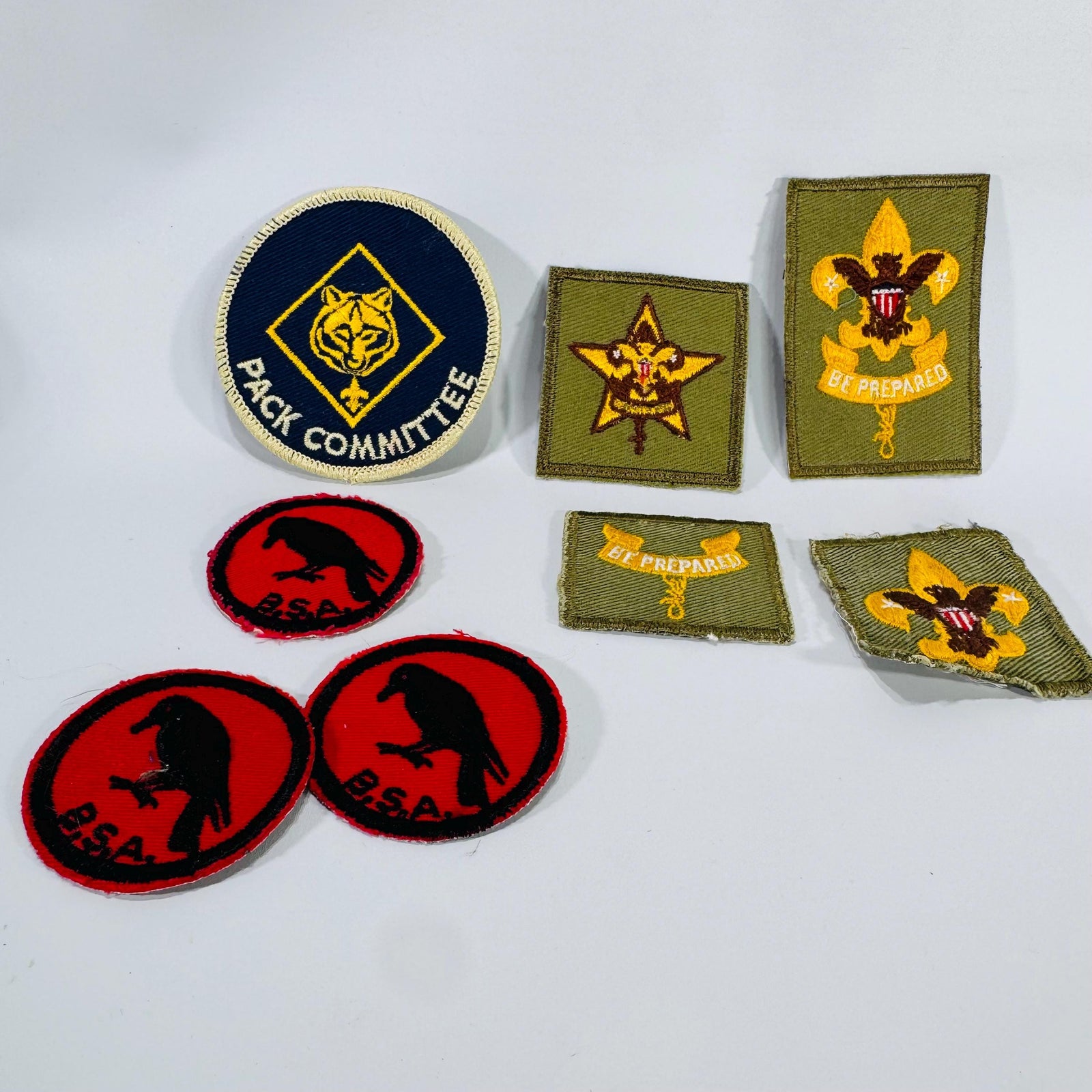 Vintage Boy Scouts of America patch lot including Pack Committee, Be Prepared, and red BSA uniform patches