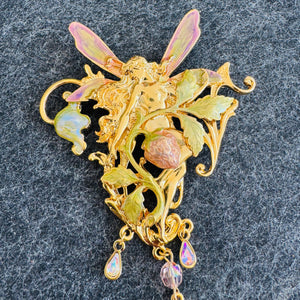 Gold-tone Kirk’s Folly fairy brooch/pendant with iridescent pink-purple wings, green enamel leaves, strawberry detail, and dangling AB teardrop crystal charms