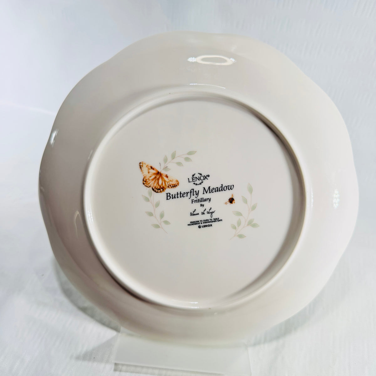 Back of Lenox Butterfly Meadow Fritillary plate showing maker mark, pattern name and care instructions