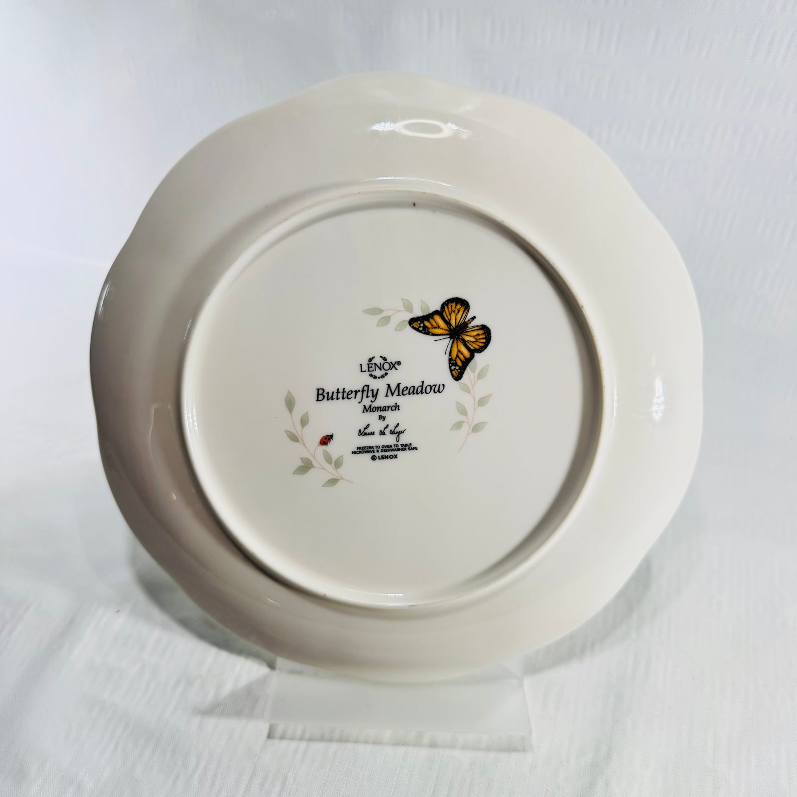 Back of Lenox Butterfly Meadow Monarch plate showing Lenox mark, pattern name and care instructions