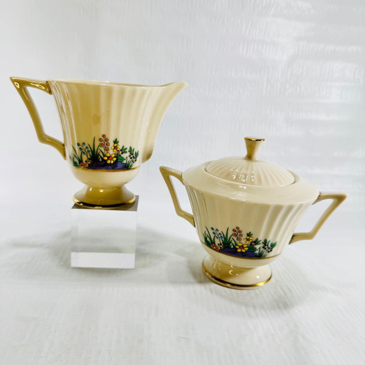 Lenox Rutledge footed creamer and covered sugar bowl set in ivory china with gold trim