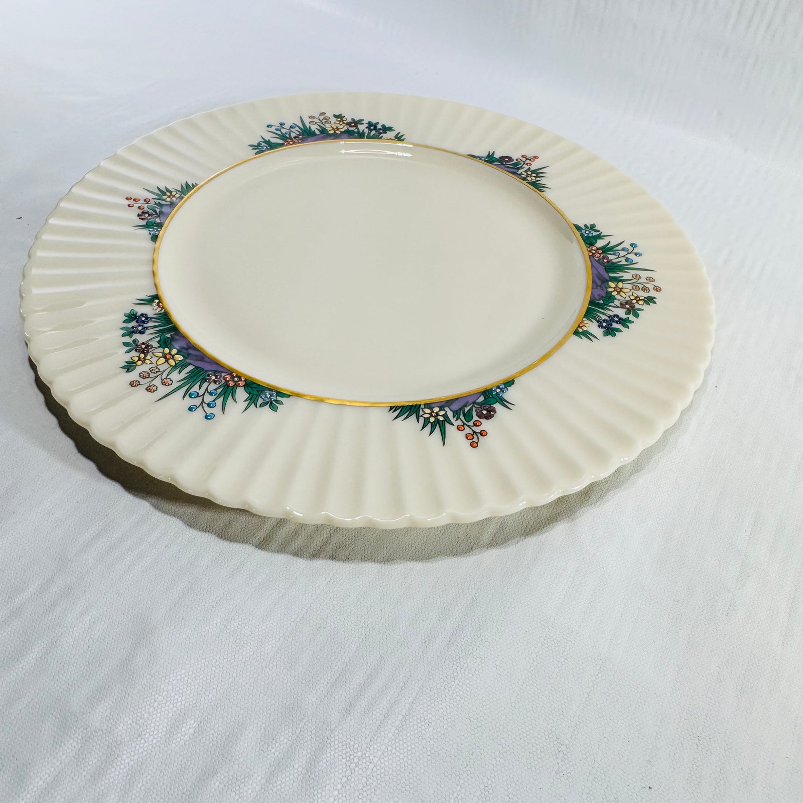 Lenox Rutledge plate on a white surface showing the full scalloped rim