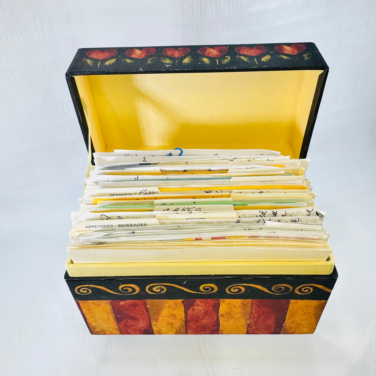 Main Street Press Romance recipe box open and packed full of handwritten recipe cards