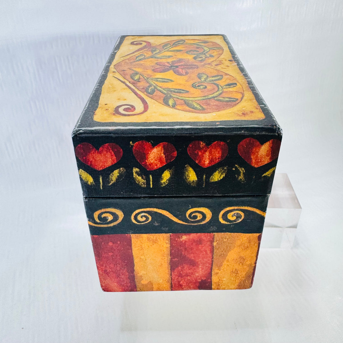 Other side of the folk art heart recipe box showing the floral heart lid
