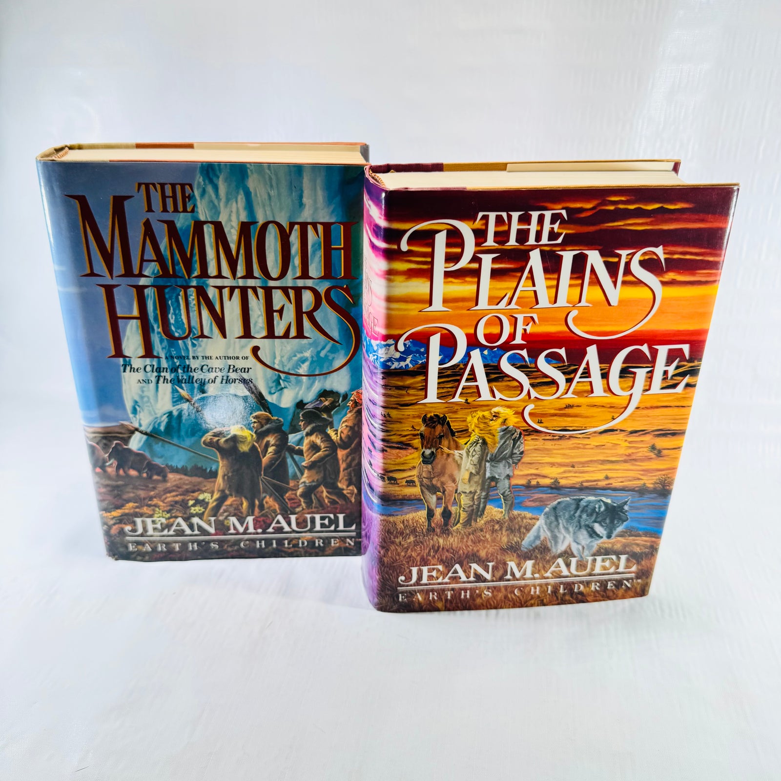 Both Jean M. Auel hardcovers in jackets, Mammoth Hunters and The Plains of Passage