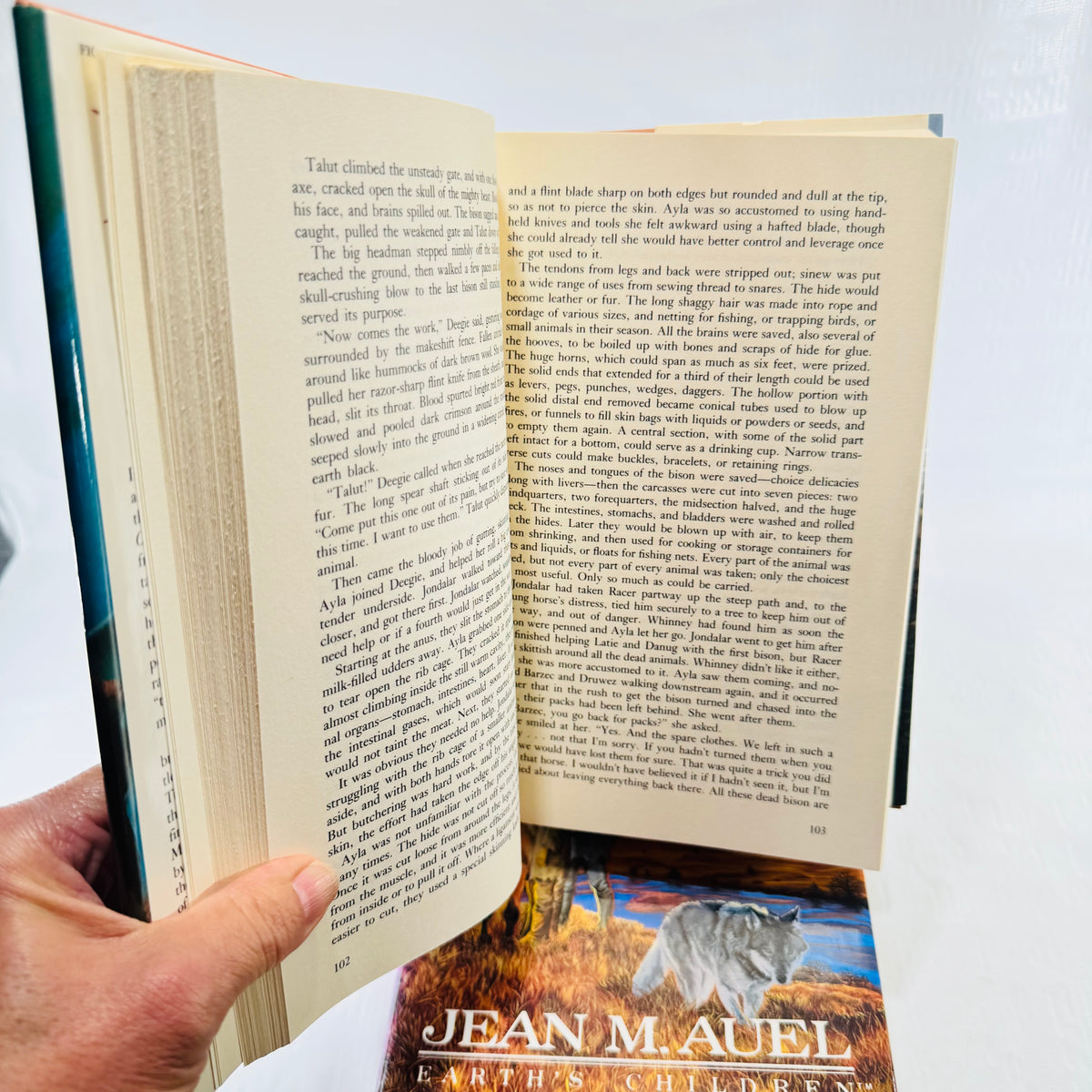 Interior text pages 102 and 103 of The Mammoth Hunters