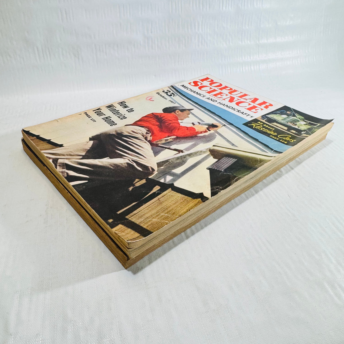 Stack of two 1951 Popular Science issues with the October cover facing front