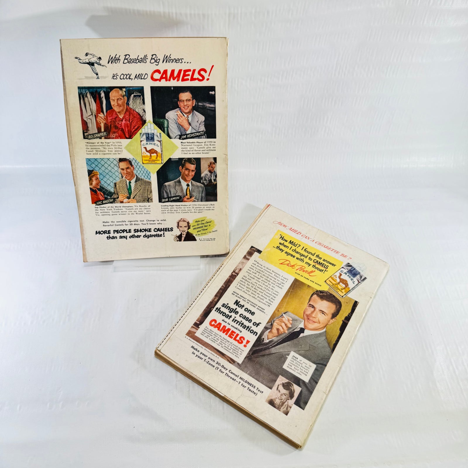 Back covers of both 1951 Popular Science issues with Camel cigarette advertisements