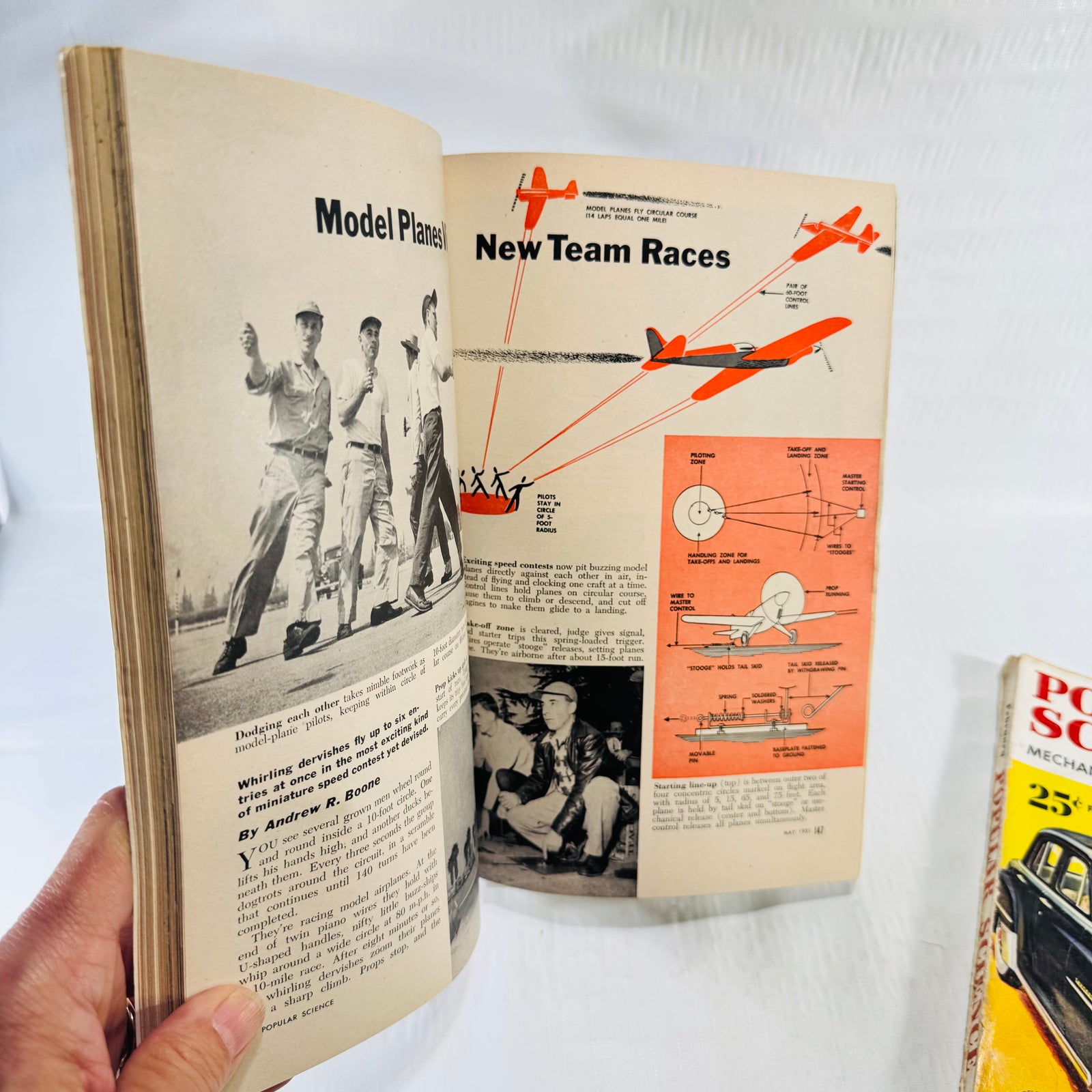 May 1951 Popular Science spread on model plane racing, three men watching planes overhead