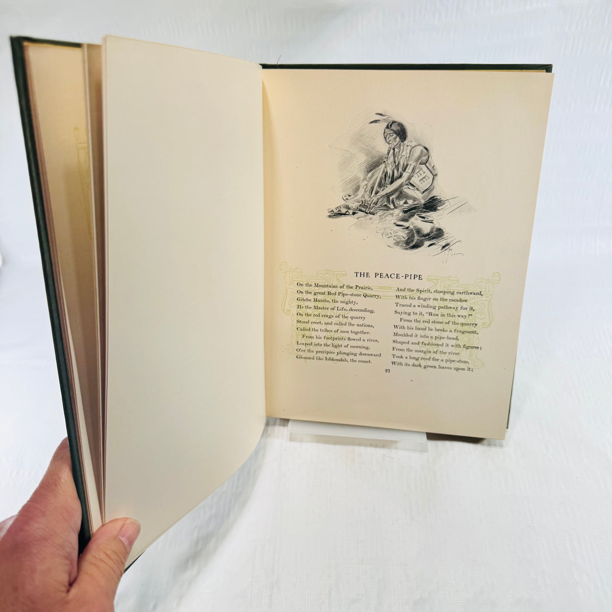 The Peace-Pipe illustration on page 21 with green line decorations