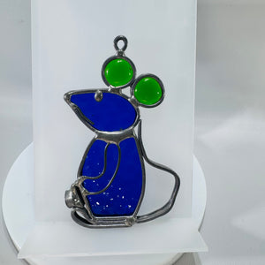 Blue and green stained glass mouse suncatcher with silver-tone soldered outline and hanging loop, shown from front, side, and laying flat.