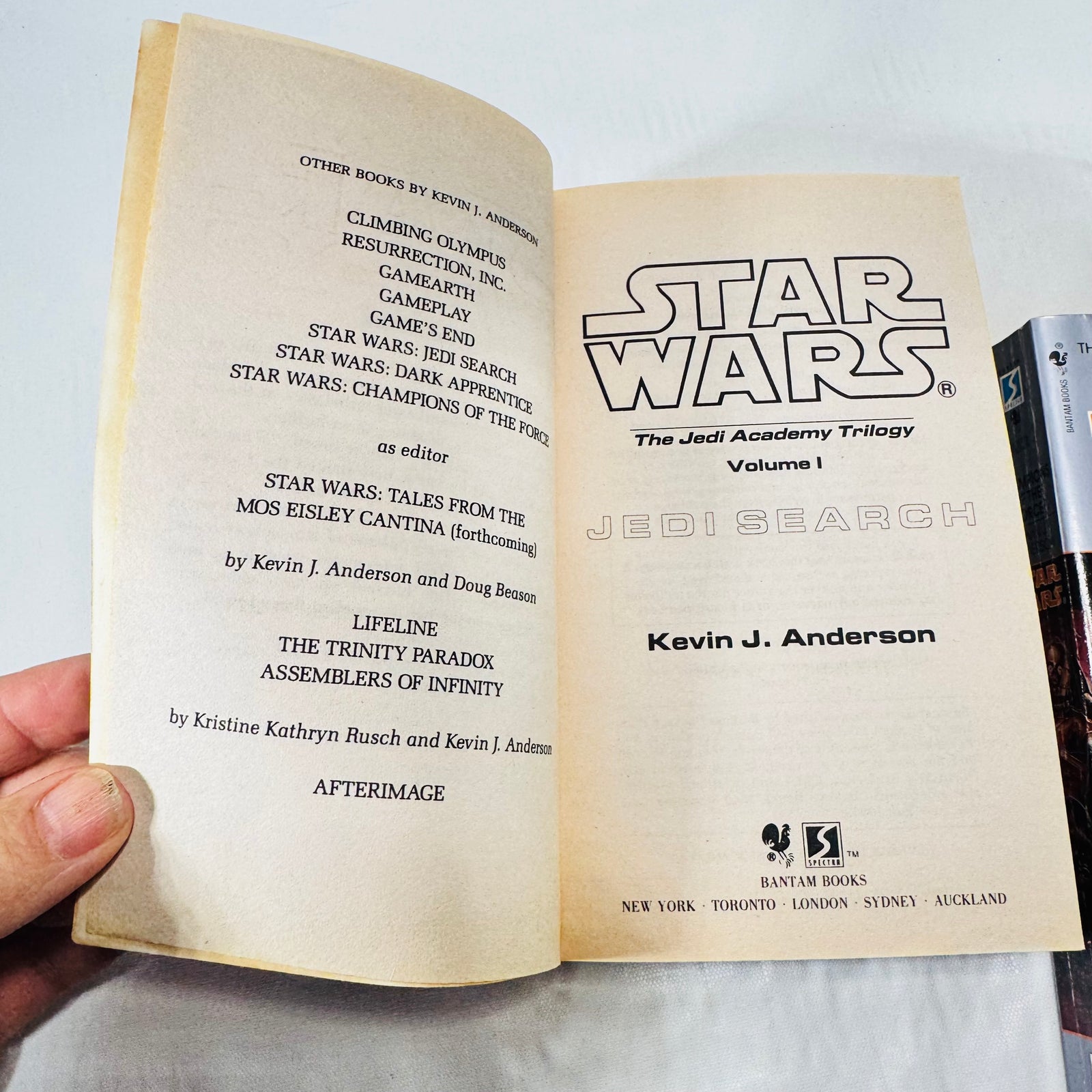 Front covers of all three Star Wars Jedi Academy Trilogy paperbacks by Kevin J. Anderson: Jedi Search, Dark Apprentice, and Champions of the Force.