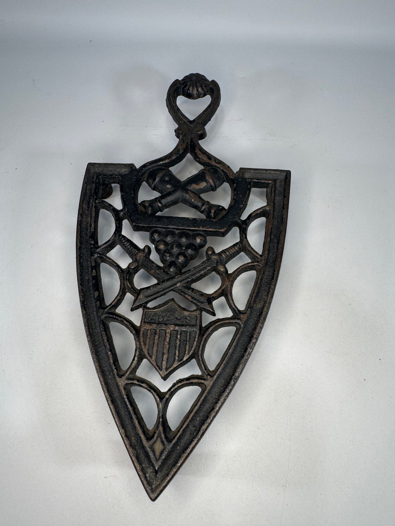 Vintage Cast Iron Sad Iron Trivet Military Patriotic Design