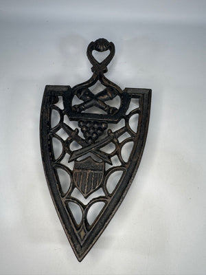 Vintage Cast Iron Sad Iron Trivet Military Patriotic Design