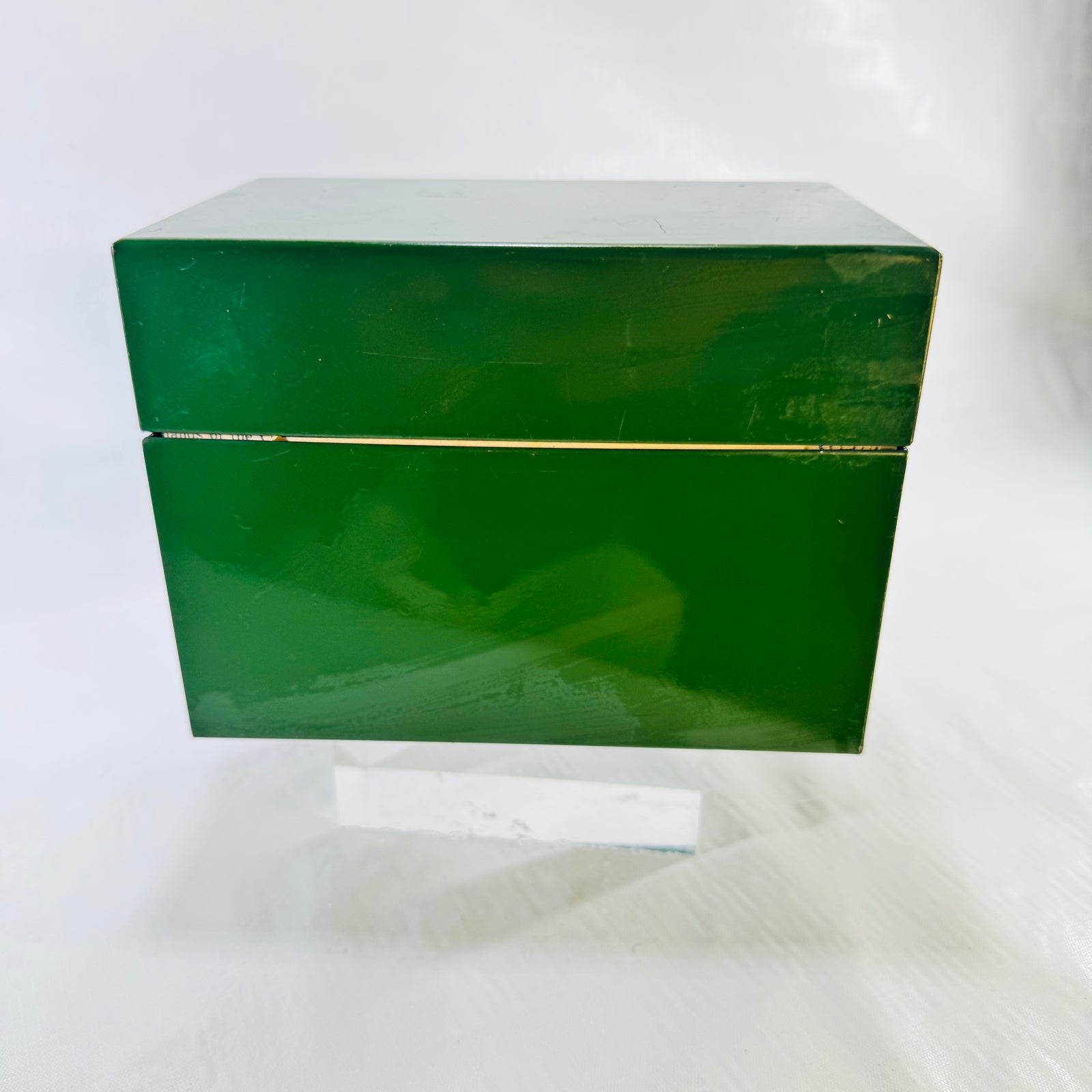 Closed vintage green metal recipe box, front view