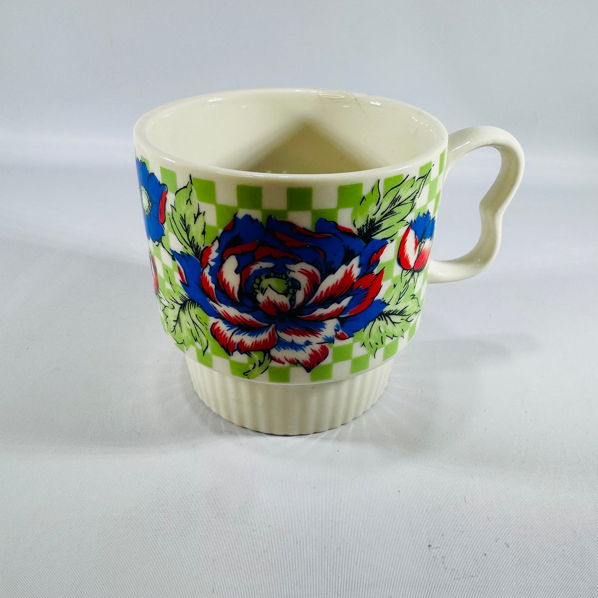 Vintage Japan Stackable Coffee Mug — Bold Blue Red Peony Floral on Green Checker, Ribbed Base, Mid-Century Export Ceramic