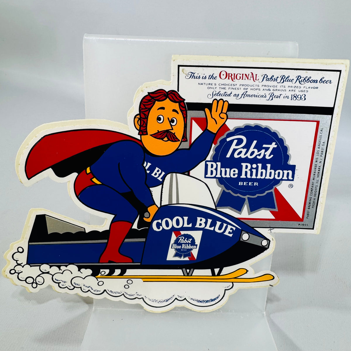 Vintage Pabst Blue Ribbon "Cool Blue" Snowmobile Die-Cut Sticker Sign — PBR Breweriana Advertising Display, Pabst Brewing Company Milwaukee Wisconsin