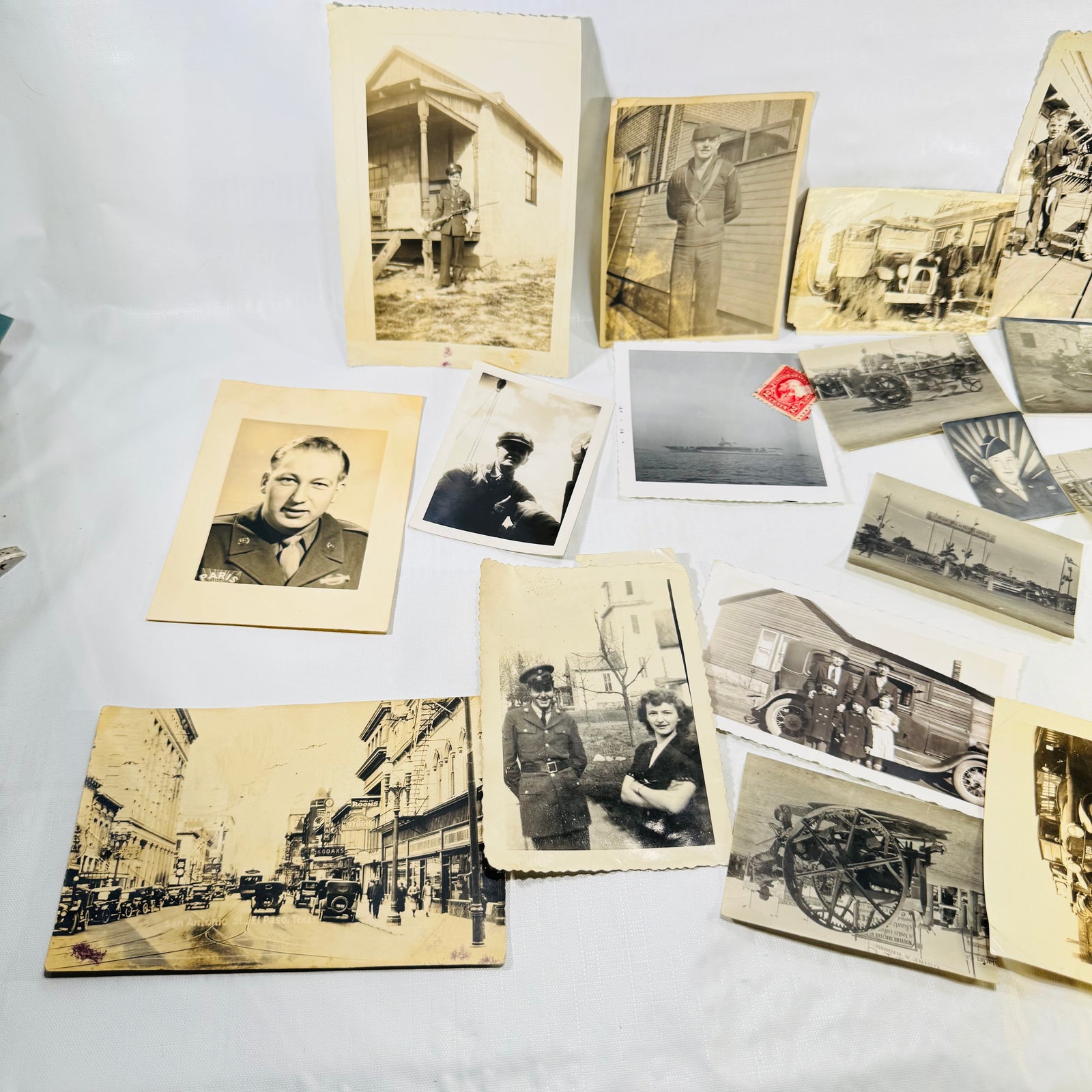 Close-up of the officer studio portrait and family snapshots in the vintage photo lot