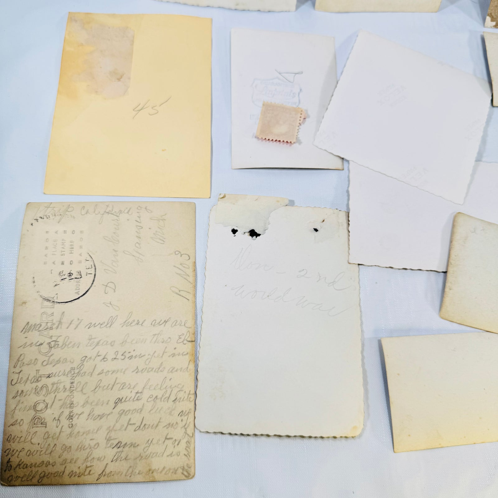 Handwritten postcard back and photo backs from the vintage snapshot lot