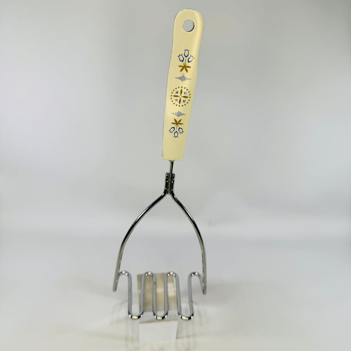 EKCO Carousel Blue Dutch Tulip Potato Masher 1960s