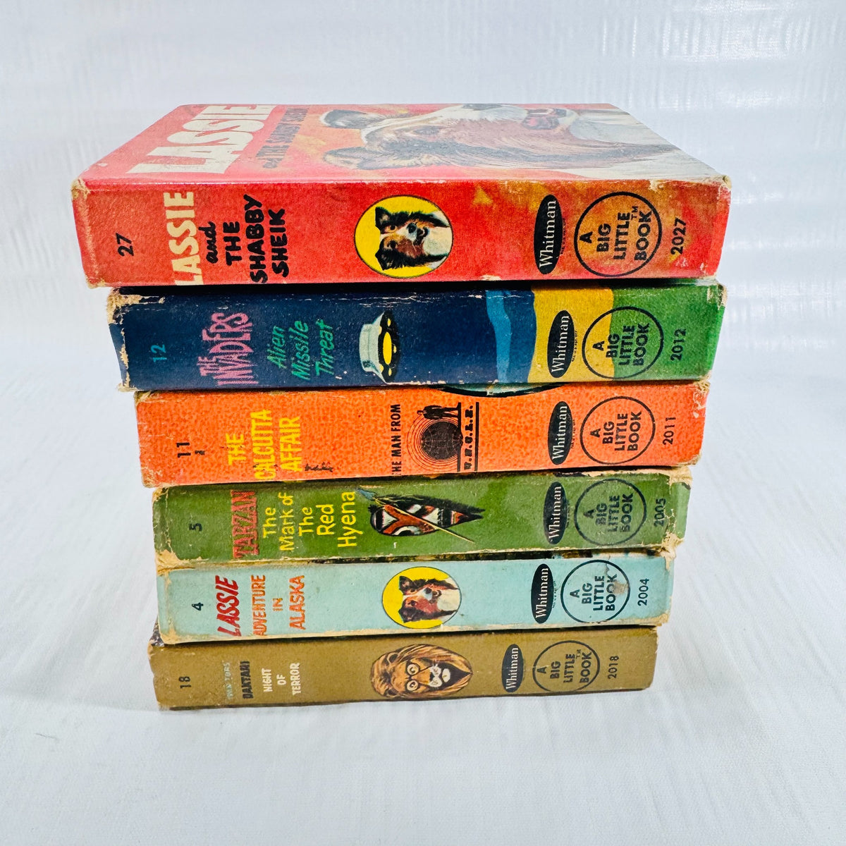 Six Whitman Big Little Books bundle, numbered spines stack