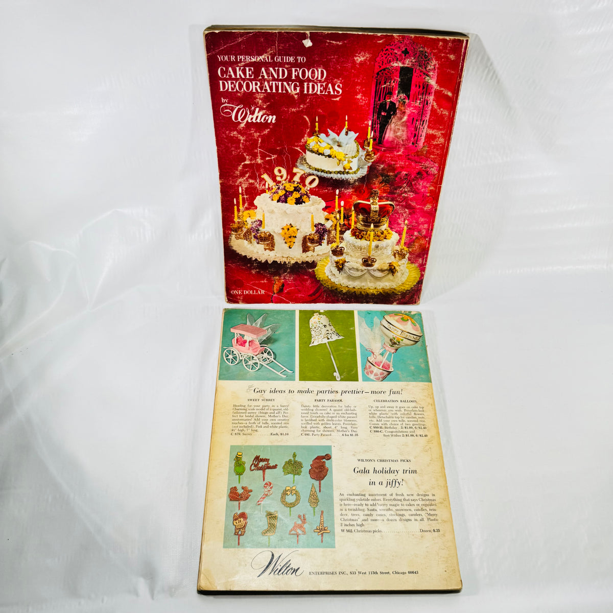 Red Wilton front cover and green Wilton back cover showing wear