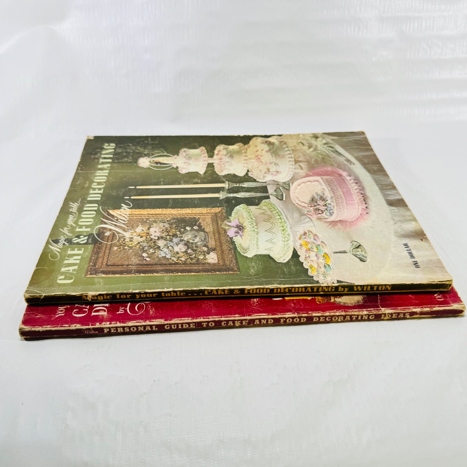 Spines of the two vintage Wilton cake decorating books