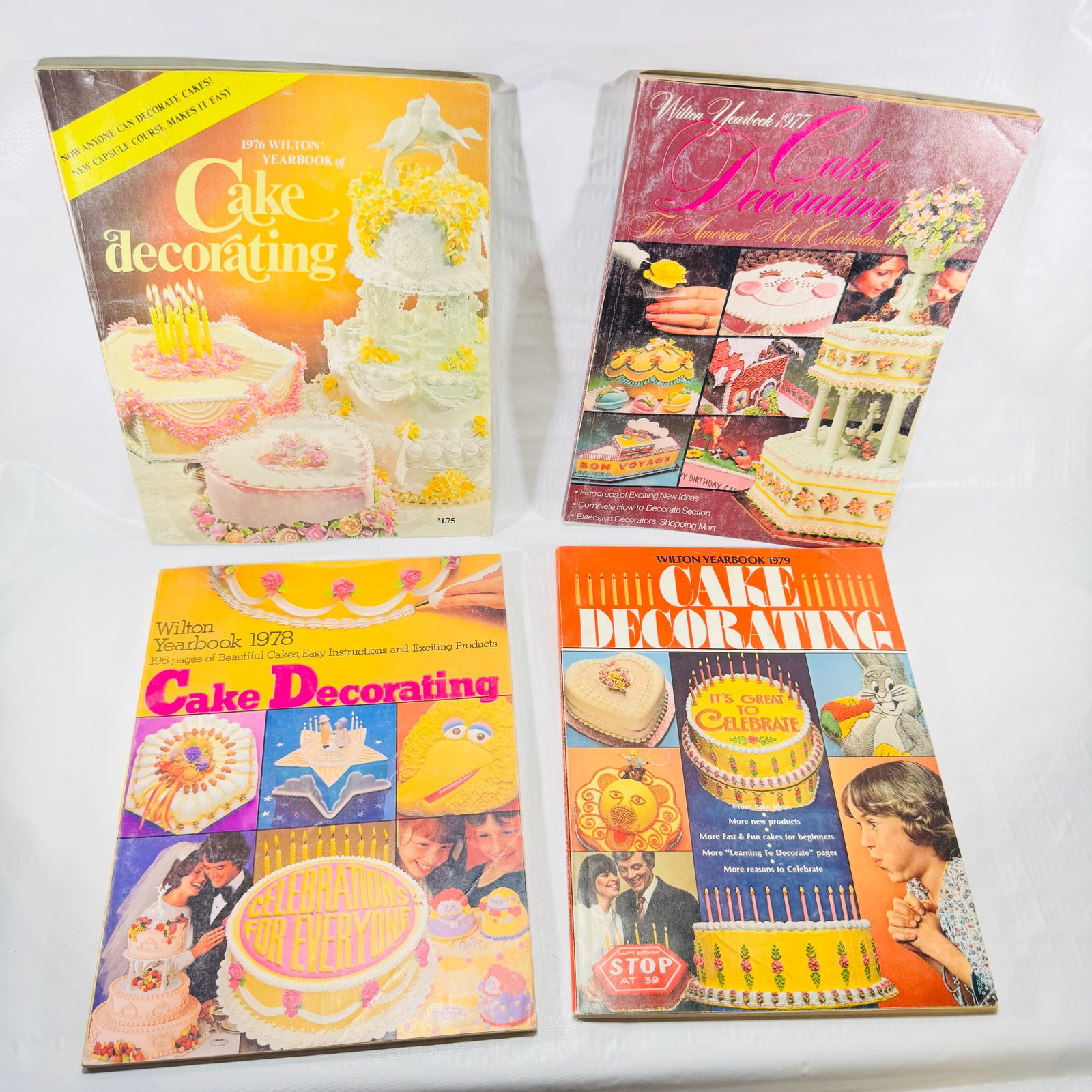 Four Wilton Yearbooks of Cake Decorating 1976 to 1979 front covers