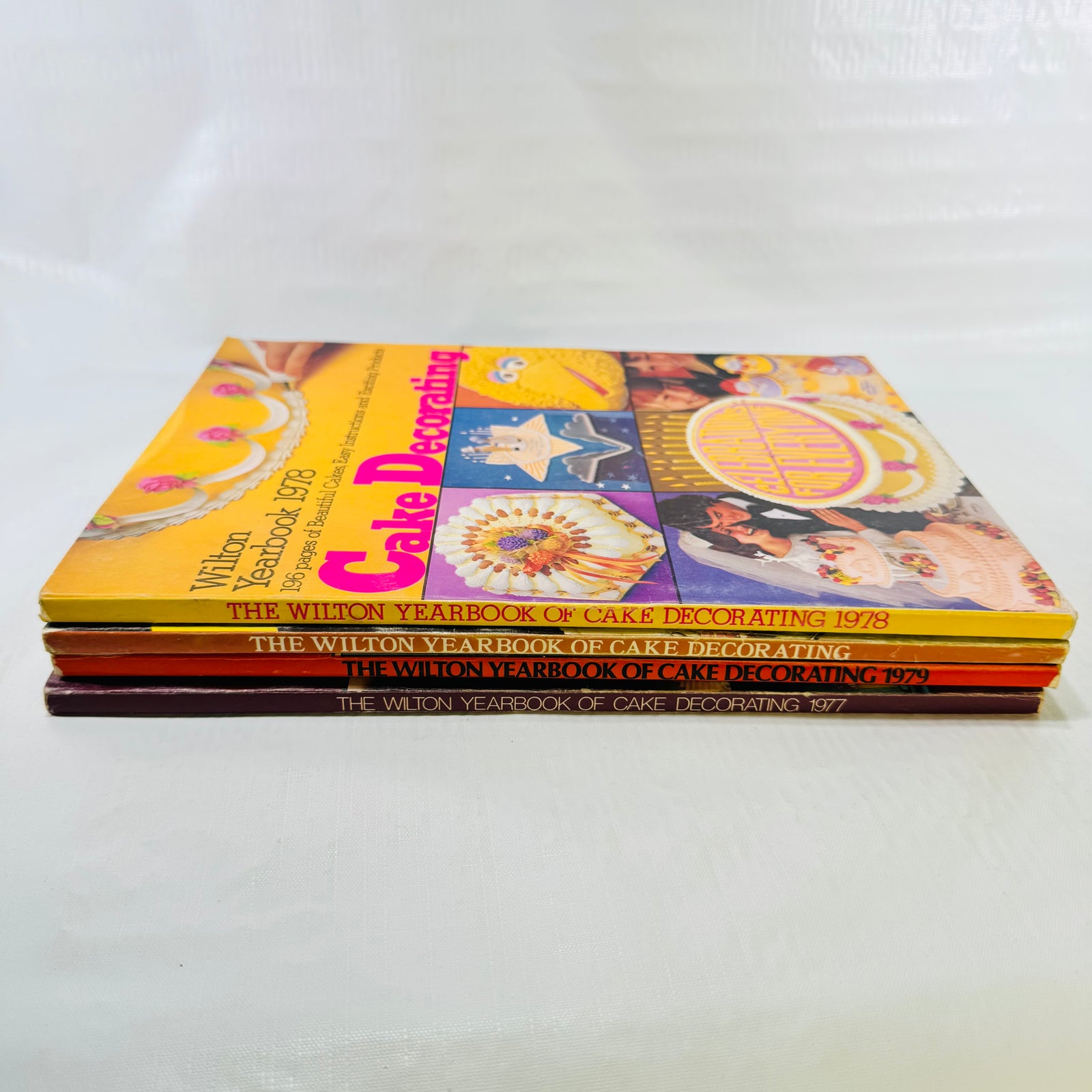 Spines of the four Wilton Yearbooks 1976 to 1979