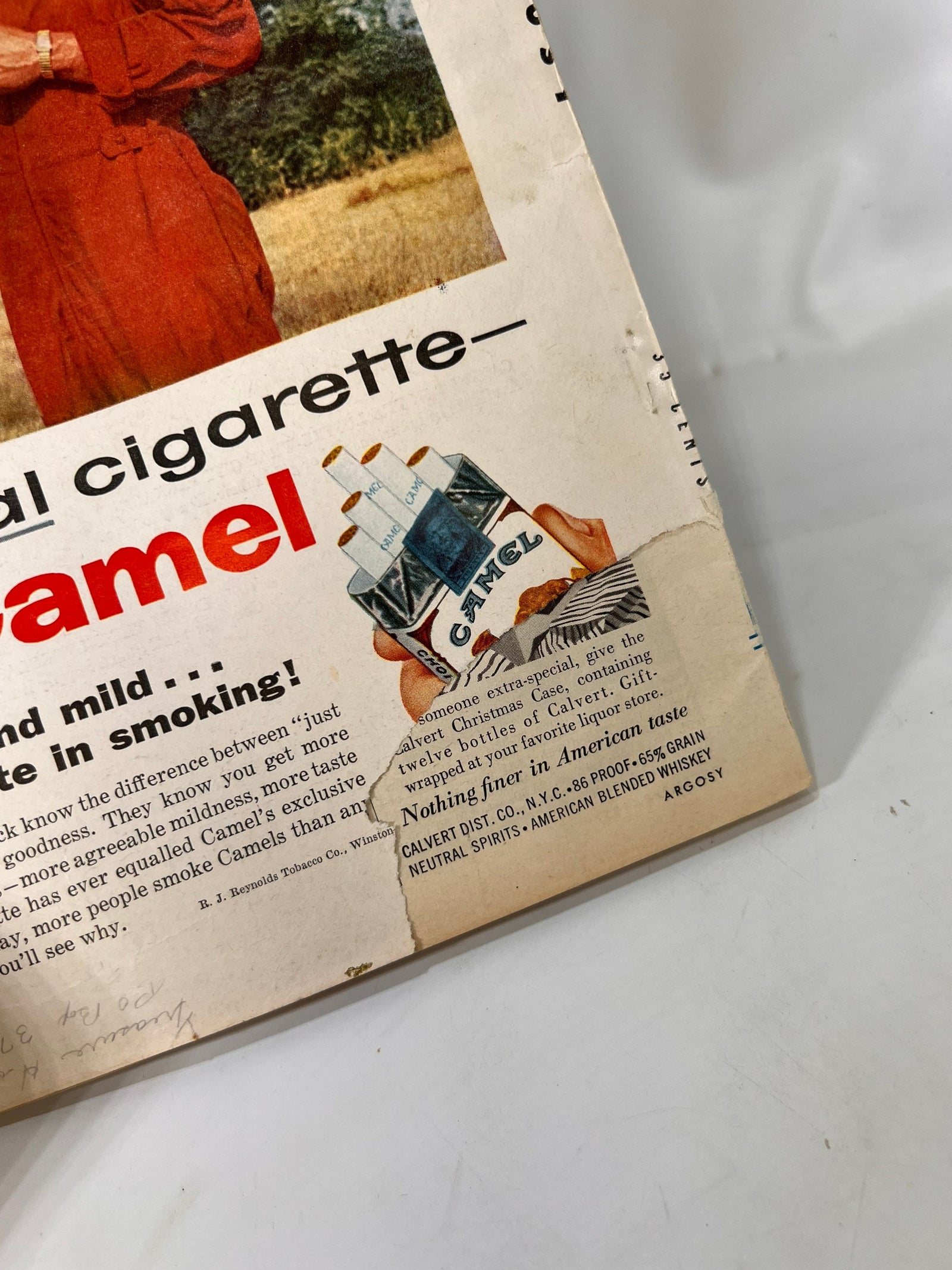 Camel cigarettes ad on the back cover, Argosy December 1957